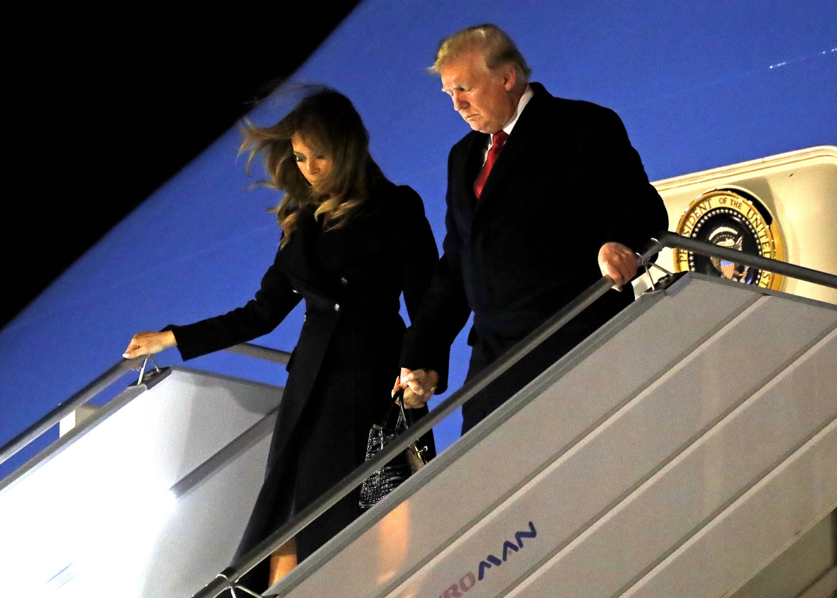 Trump opens armistice visit to France with jab at Macron